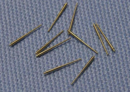 Gold-colored pins on a textured blue background