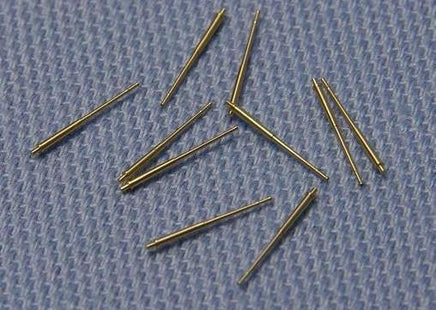 Gold-colored pins on a textured blue background