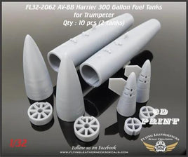 Two gray resin aftermarket fuel tanks for 1/32 scale AV-8B Harrier model aircraft, showing detailed surface panels and mounting points on white background with Flying Leathernecks packaging
