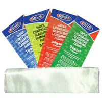 Five packages of Deluxe brand laminating fabric with visible text on a white background.