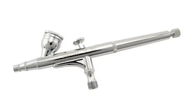 Silver airbrush gun on a white background