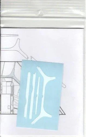 Light blue decal with a white design on a clear plastic sheet