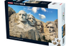Jigsaw puzzle box featuring Mount Rushmore with a blue sky background