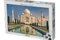 Jigsaw puzzle box featuring the Taj Mahal with a reflection in water