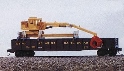 Model of a railroad vehicle with 'Alaska Railroad' branding on a plain background
