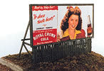 Model of a vintage billboard with a woman's face and text on a stand.