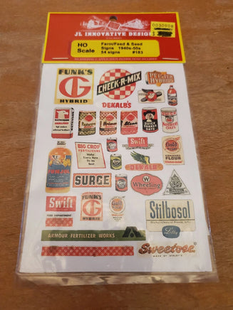 Packaging of JL Innovative Design HO scale model sign set on a wooden surface