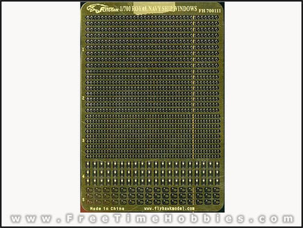 Model ship kit with detailed parts on a green background, featuring FreeTimeHobbies branding.