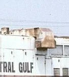 Building with 'Central Gulf' branding on a clear sky background