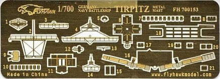 Model kit packaging for German battleship Tirpitz with scale details on a brown background.