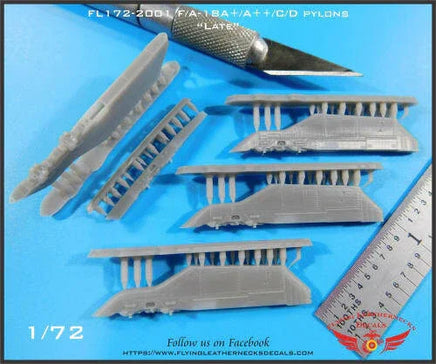 Model airplane parts with a knife and ruler on a blue background, featuring 'Flying Leathernecks Decals' branding.