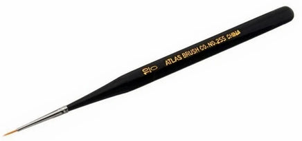 Black paintbrush with gold text on a white background