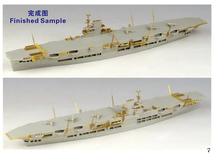 Model of a large ship with gold accents on a white background, labeled 'Finished Sample'.
