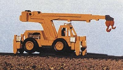 Model of a crane toy on a plain background