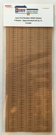 Model train track material packaging with laser-cut random width shapes on a white background