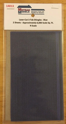 Model shingles packaging with text on a wooden surface