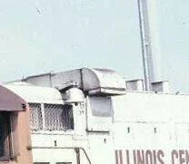 Building with a large air conditioning unit on top, labeled 'Illinois Central'.