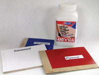 Sand'n'Seal container with balsawood and plywood samples on a white background