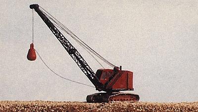 Red crane with a hook on a plain background