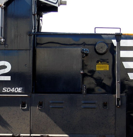 Close-up of a black industrial machine with visible branding and model number.