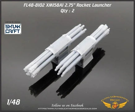 1/48 scale Flying Leathernecks XM158A1 2.75 rocket launcher aftermarket resin detail set showing gray unpainted launcher pods with mounting hardware for scale model aircraft
