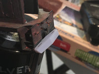 Close-up of a mechanical component with a blurred background