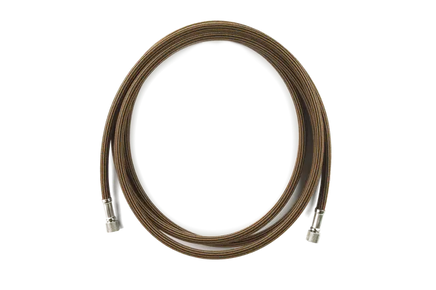 Coiled metal cable with silver connectors on a white background