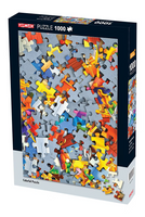 Puzzle box with colorful puzzle pieces and 'Tomax' branding