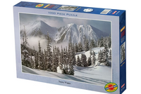 Jigsaw puzzle box with a snowy mountain and tree design on the cover