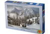 Jigsaw puzzle box with a snowy mountain and tree design on the cover