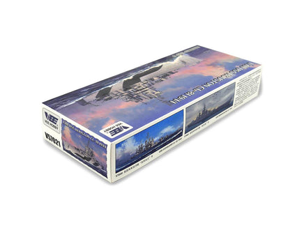 Model kit packaging with mountain and sky design on a white background