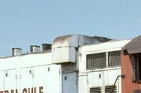 Building with a sign that reads 'Central Gulf' against a blue sky.