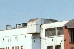 Building with a sign that reads 'Central Gulf' against a blue sky.