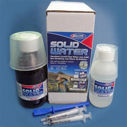 Solid Water product set with bottles, syringes, and packaging on a blue background