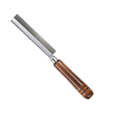 Wood chisel with a wooden handle on a white background