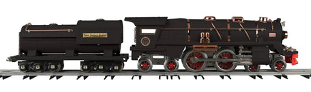 Model steam locomotive on a white background
