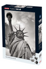 Jigsaw puzzle box featuring the Statue of Liberty against a cloudy sky