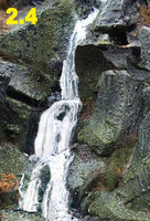Small waterfall flowing over rocks with a rating of 2.4 displayed.