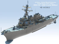 Model of a US Navy guided missile destroyer on a light blue background