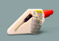 White applicator with red top and black text on a gray background
