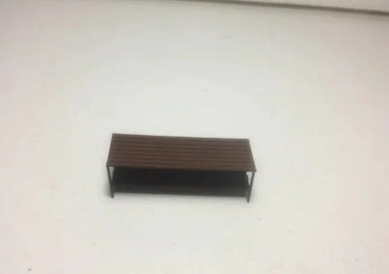 Rectangular wooden shelf on a white floor