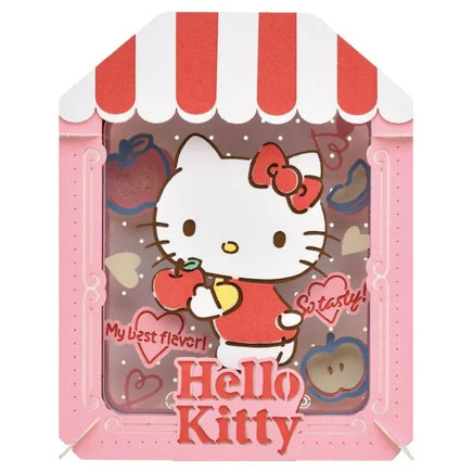 Hello Kitty-themed product packaging with a red and white striped roof