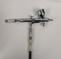 Close-up of Vigiart HS-117 quick disconnect fitting showing precision BSP threading and release mechanism
