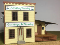 Model of a two-story building with 'A Taste of Country' and 'Countryside Winery' signs.