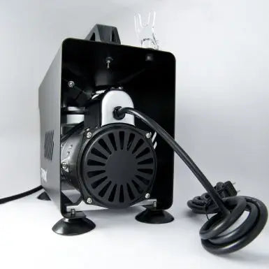 Black industrial fan with power cord on a white background