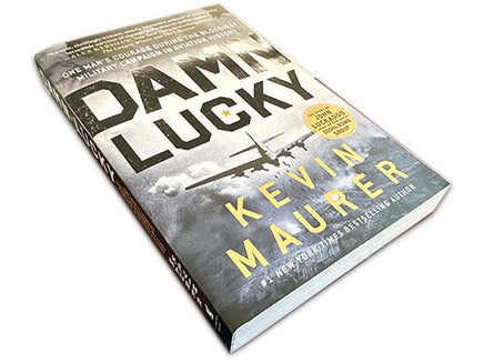 Book titled 'Damn Lucky' by Kevin Maurer on a white background