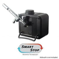 Black airbrush unit with 'Smart Stop' feature on a white background