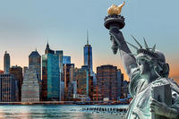 Statue of Liberty with New York City skyline at dusk