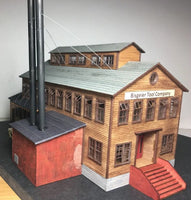 Model of a building labeled 'Bisgeler Tool Company' on a gray background