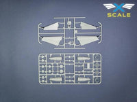 Model kit components with X-SCALE logo on a gray background